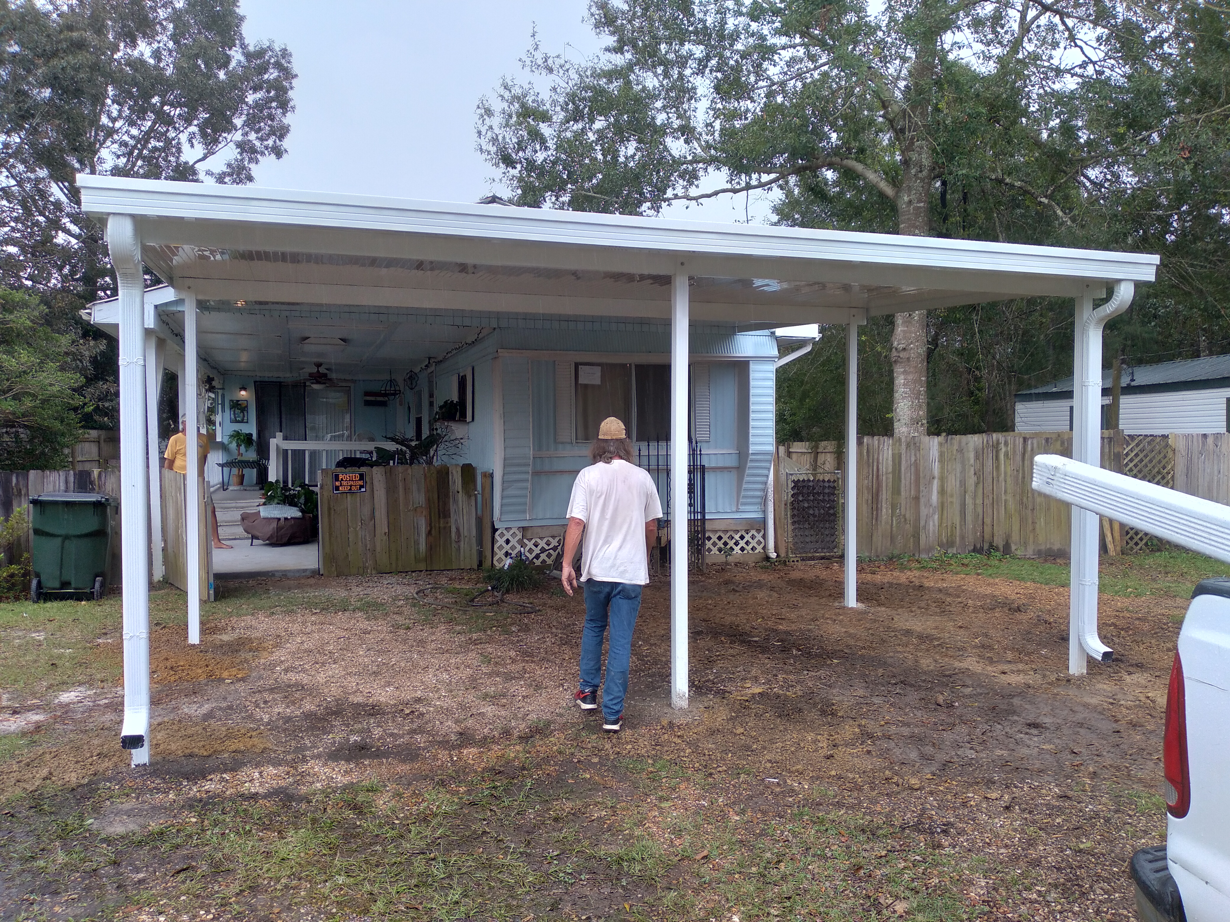 Carport covers by Oasis Exterior Solutions